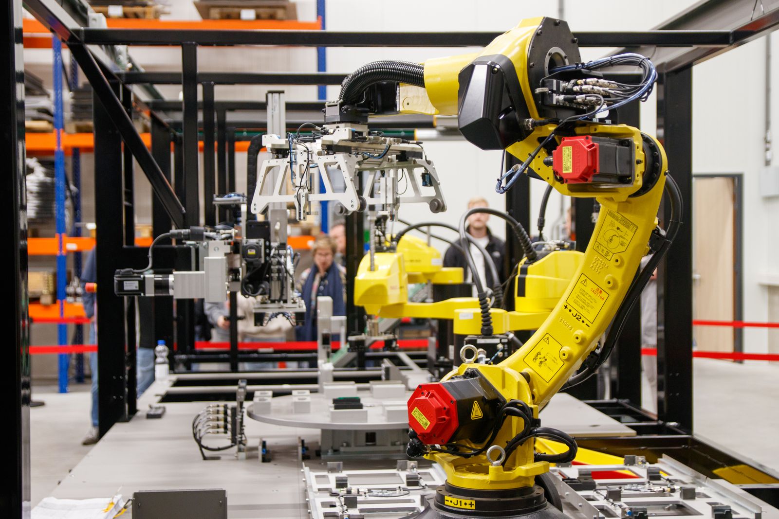Industrial robot arm on a manufacturing production line